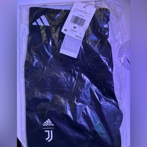 Adidas juve spandex with netted look on pants size medium